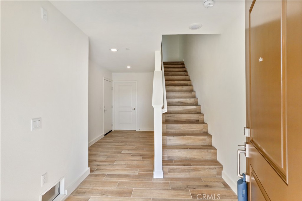 3185 Doheny Way Dana Point, CA 92629 - Photo 19 of 33 a view of entryway and hall with wooden floor