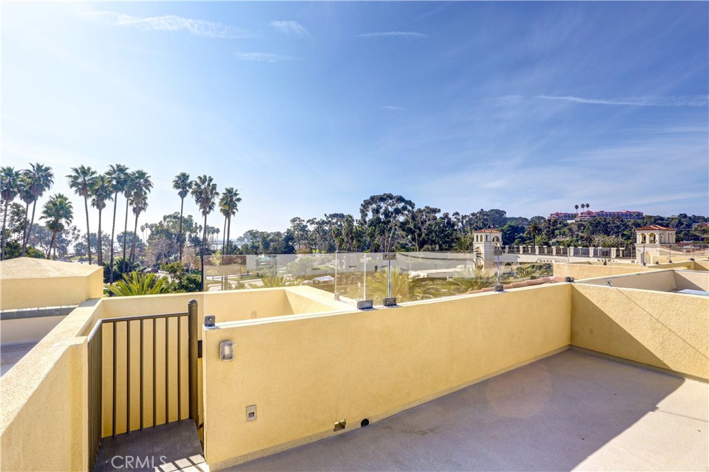 3185 Doheny Way Dana Point, CA 92629 - Photo 22 of 33 a view of a swimming pool and a terrace