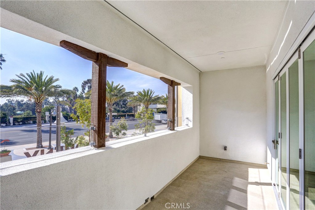 3185 Doheny Way Dana Point, CA 92629 - Photo 23 of 33 a view of a room with a large window and plants