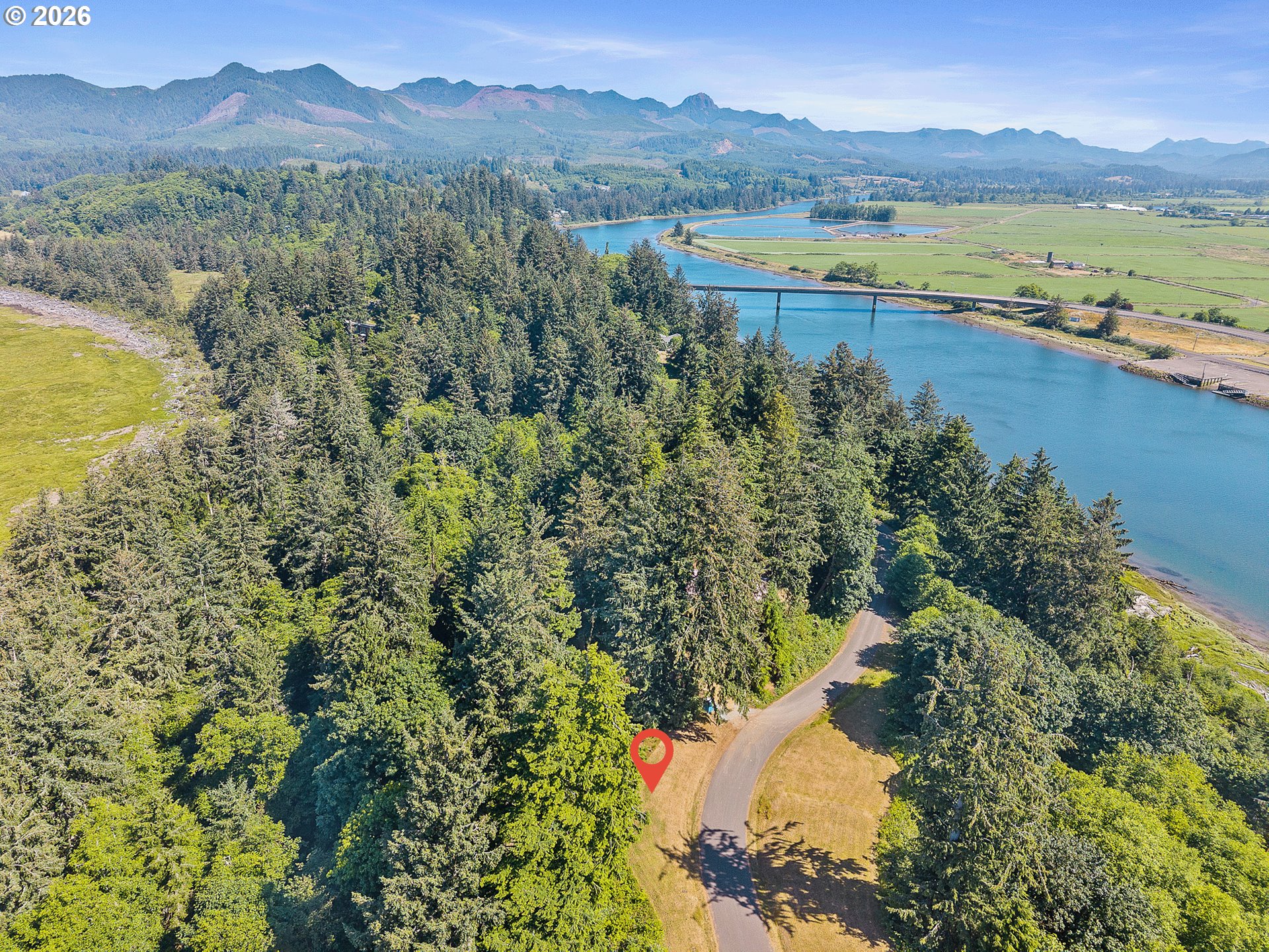 West Point Drive, Unit TL 2000 Nehalem, OR 97131 - Photo 3 of 12 a view of lake with mountain