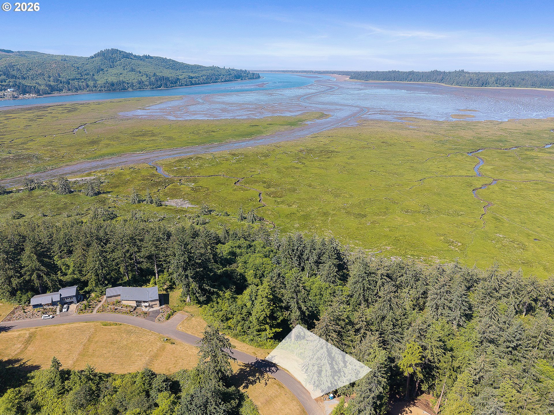 West Point Drive, Unit TL 2000 Nehalem, OR 97131 - Photo 6 of 12 a view of an ocean and a mountain