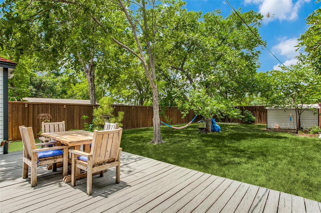 8619 Angora Street Dallas, TX 75218 - Photo 22 of 24 Wooden terrace with a lawn