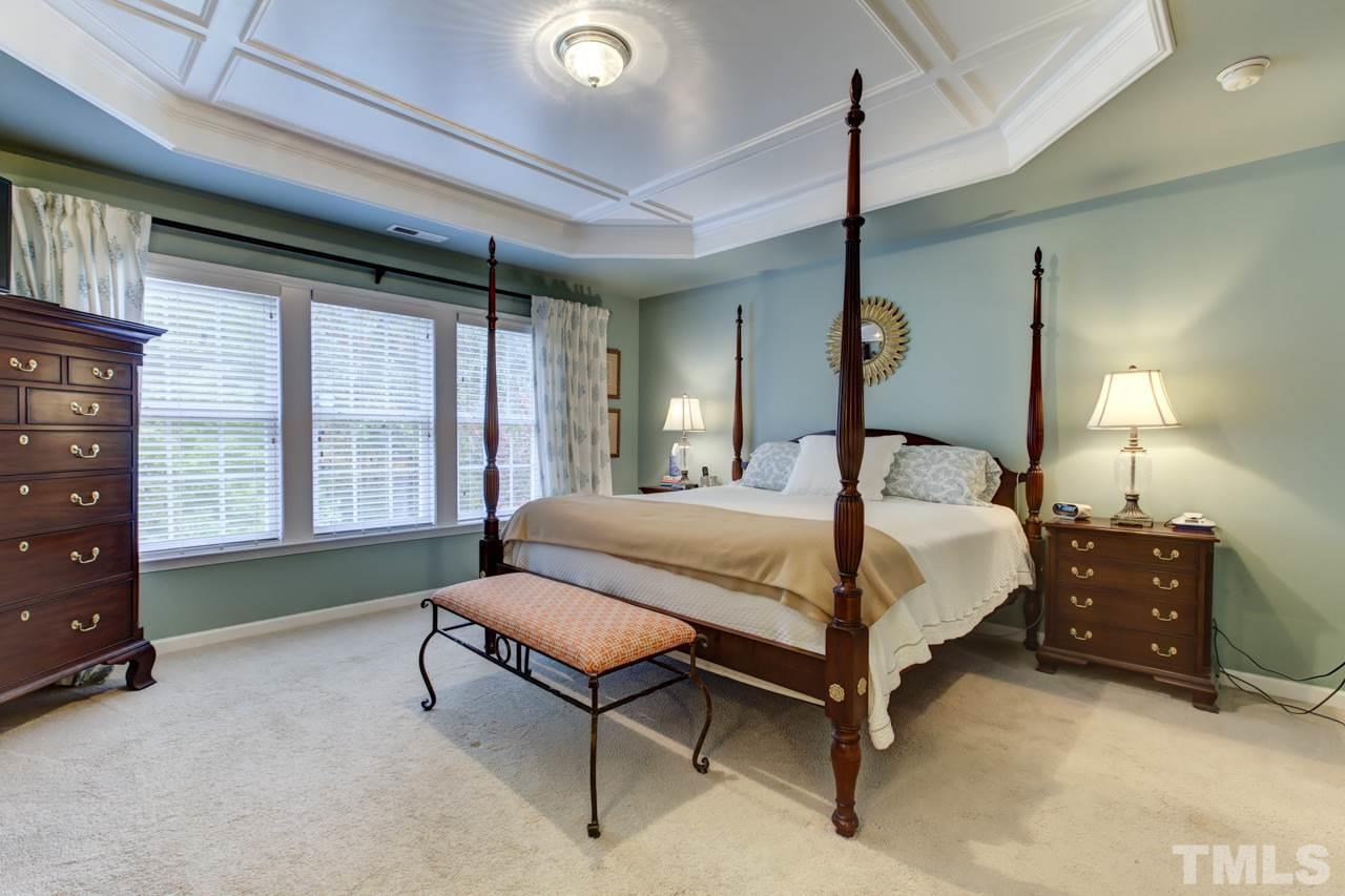 3743 Old Post Road Raleigh, NC 27612 - Photo 13 of 25 a bedroom with a bed and a window