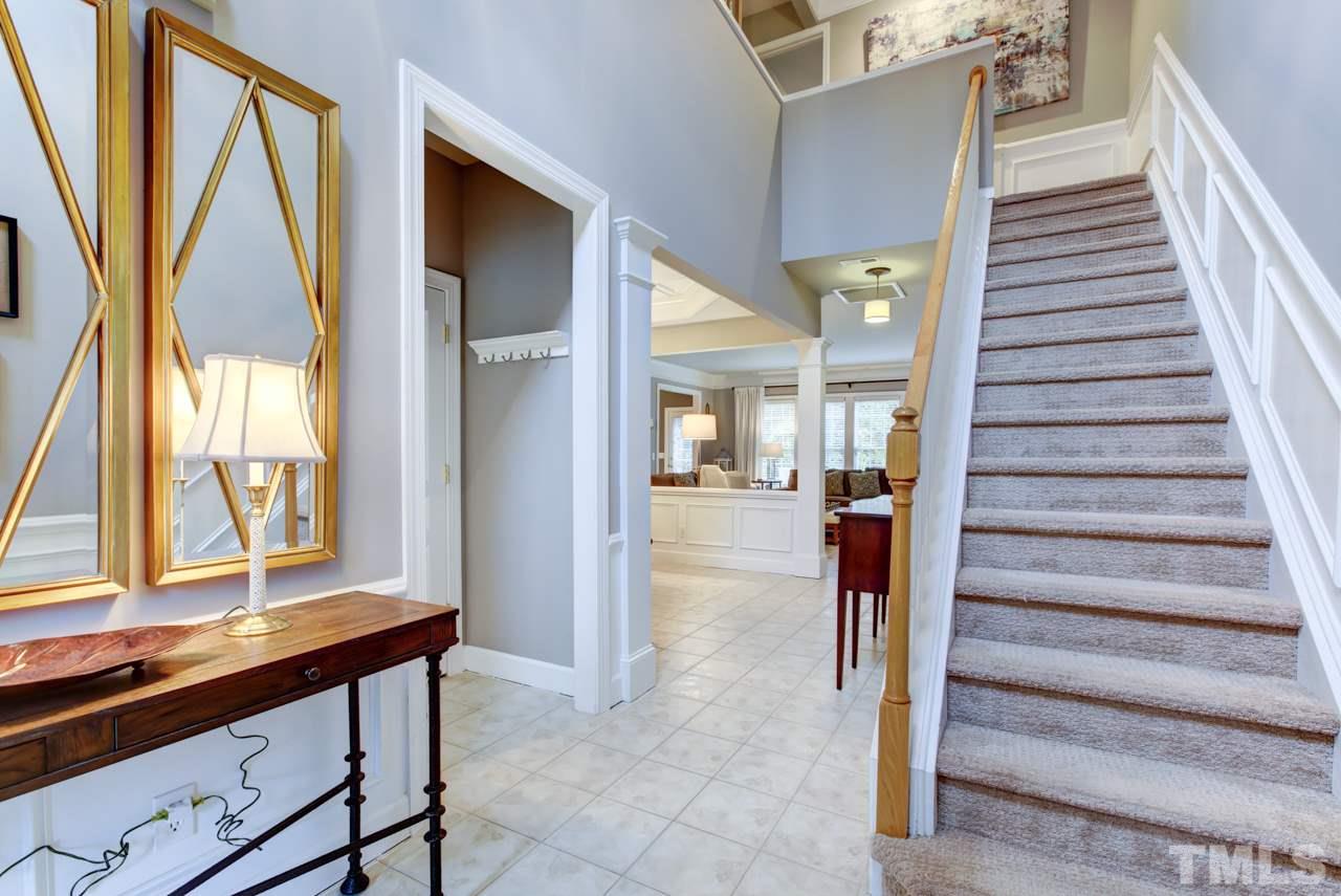 3743 Old Post Road Raleigh, NC 27612 - Photo 3 of 25 a view of entryway and hall with wooden floor