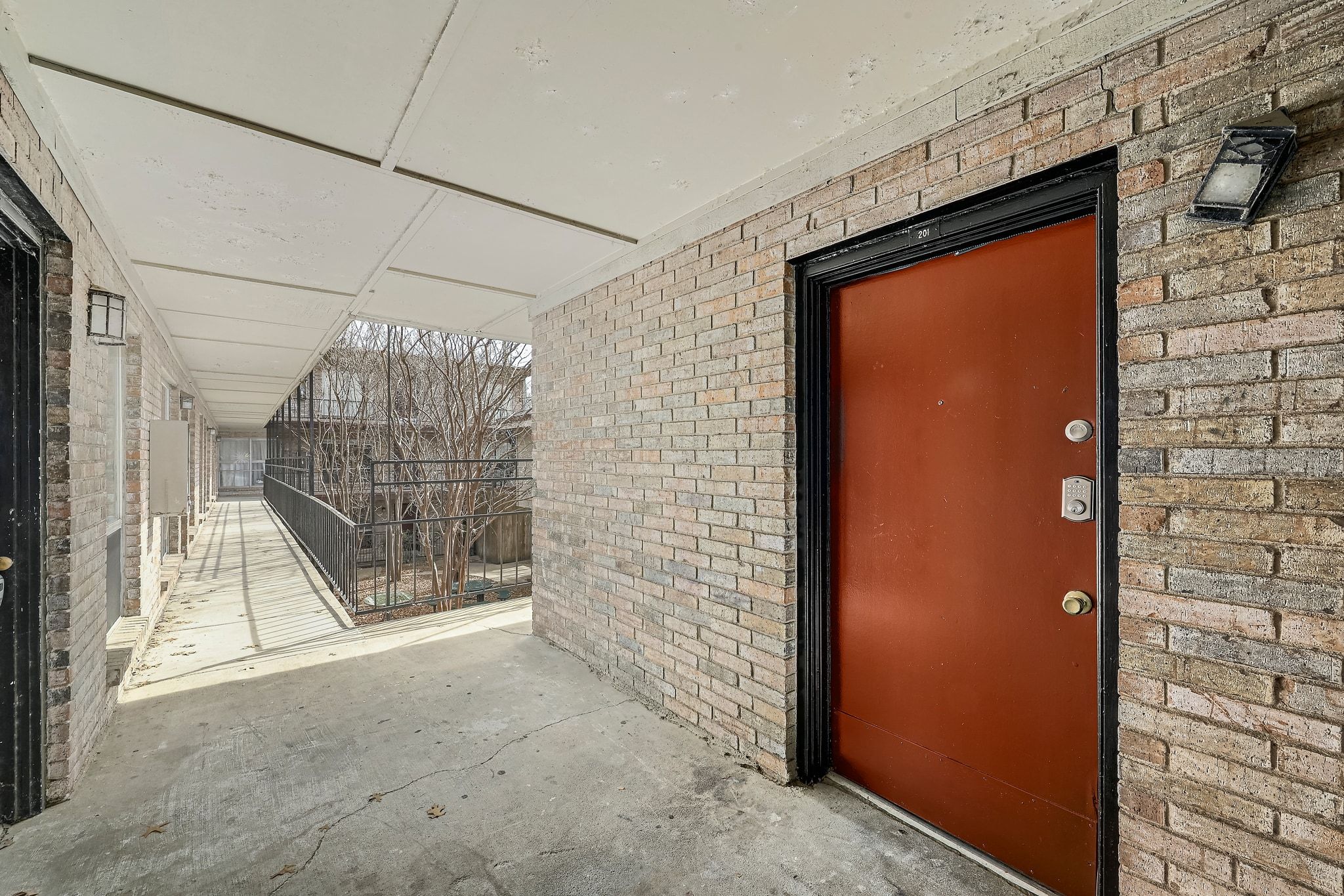 2207 Leon Street, Unit 201 Austin, TX 78705 - Photo 17 of 19 Entrance to property featuring brick siding