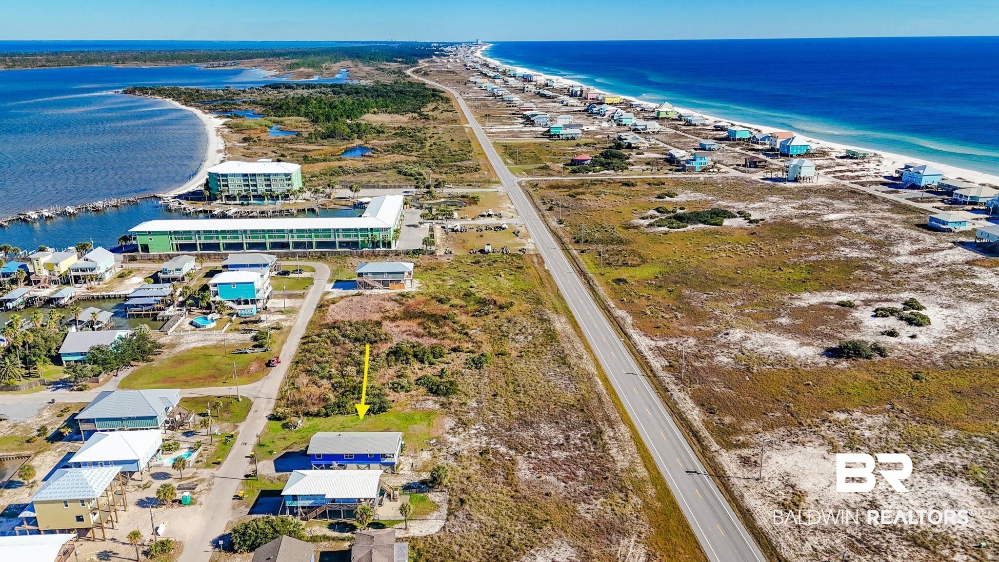 2514 Muscogee Road Gulf Shores, AL 36542 - Photo 54 of 60 Bird's eye view with a water view and a view of the beach