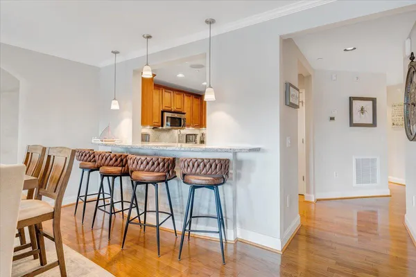 a bedroom with a bed and a table