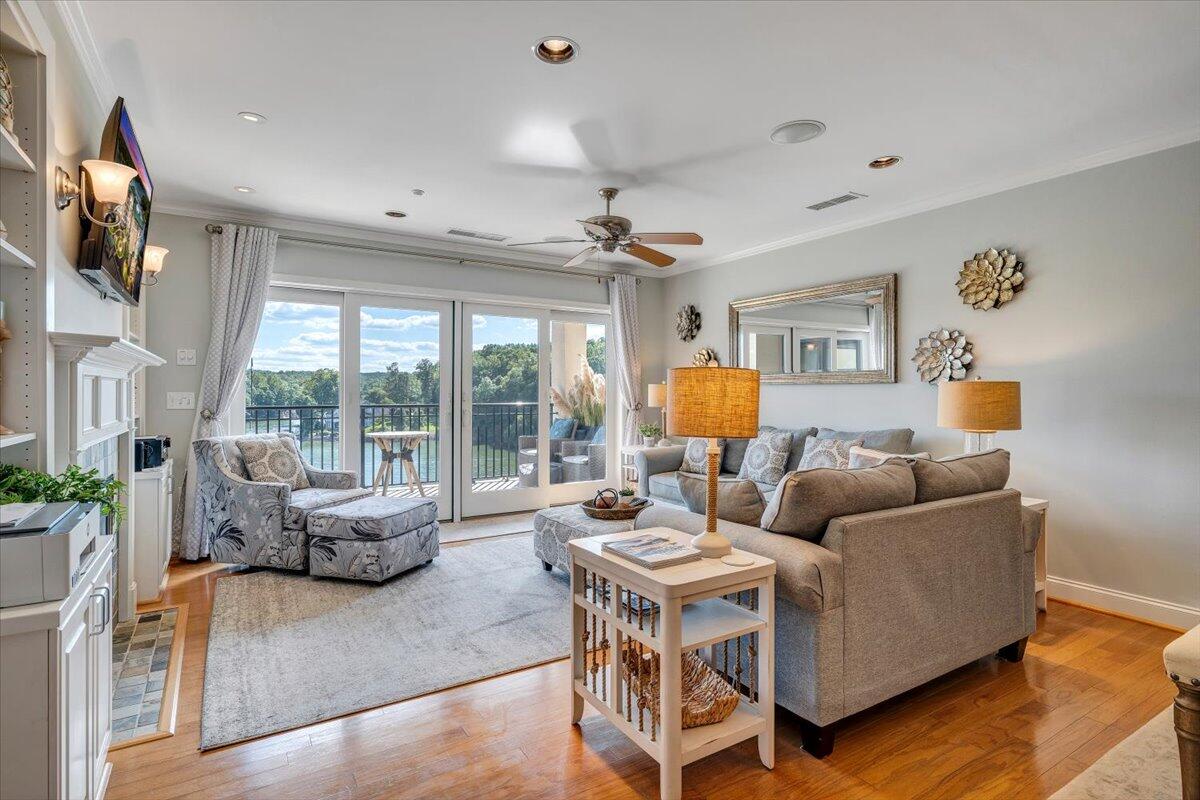 100 Bridgewater Pointe Place, Unit 502 Moneta, VA 24121 - Photo 27 of 54 a living room with furniture and a large window