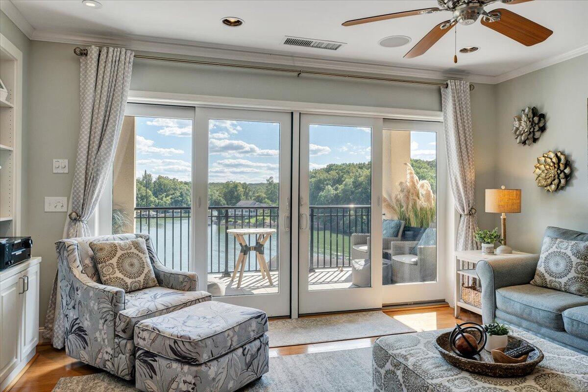 100 Bridgewater Pointe Place, Unit 502 Moneta, VA 24121 - Photo 29 of 54 a living room with furniture and a large window