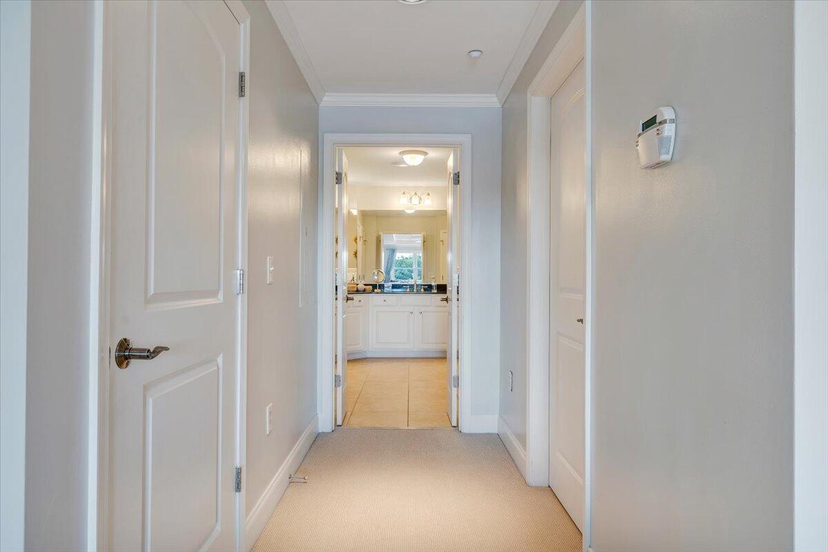 100 Bridgewater Pointe Place, Unit 502 Moneta, VA 24121 - Photo 33 of 54 a view of a hallway with a livingroom and a bathroom with sink