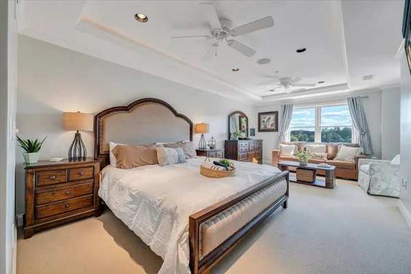 a bedroom with bed and window