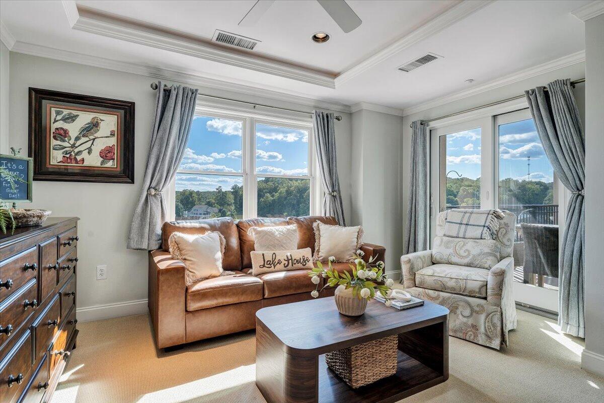 100 Bridgewater Pointe Place, Unit 502 Moneta, VA 24121 - Photo 40 of 54 a living room with furniture and a large window