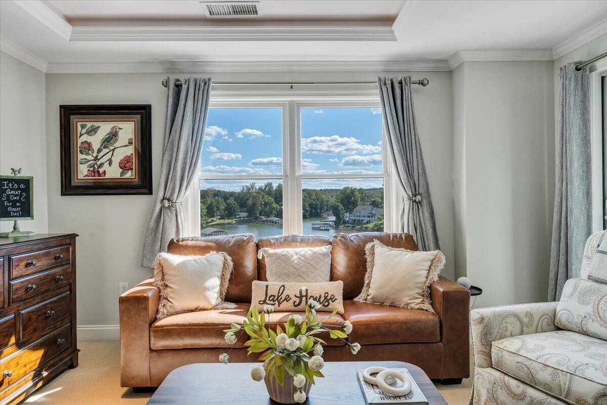100 Bridgewater Pointe Place, Unit 502 Moneta, VA 24121 - Photo 41 of 54 a living room with furniture and a large window