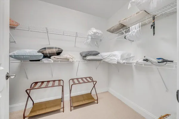 a bathroom with a toilet and a shower curtain