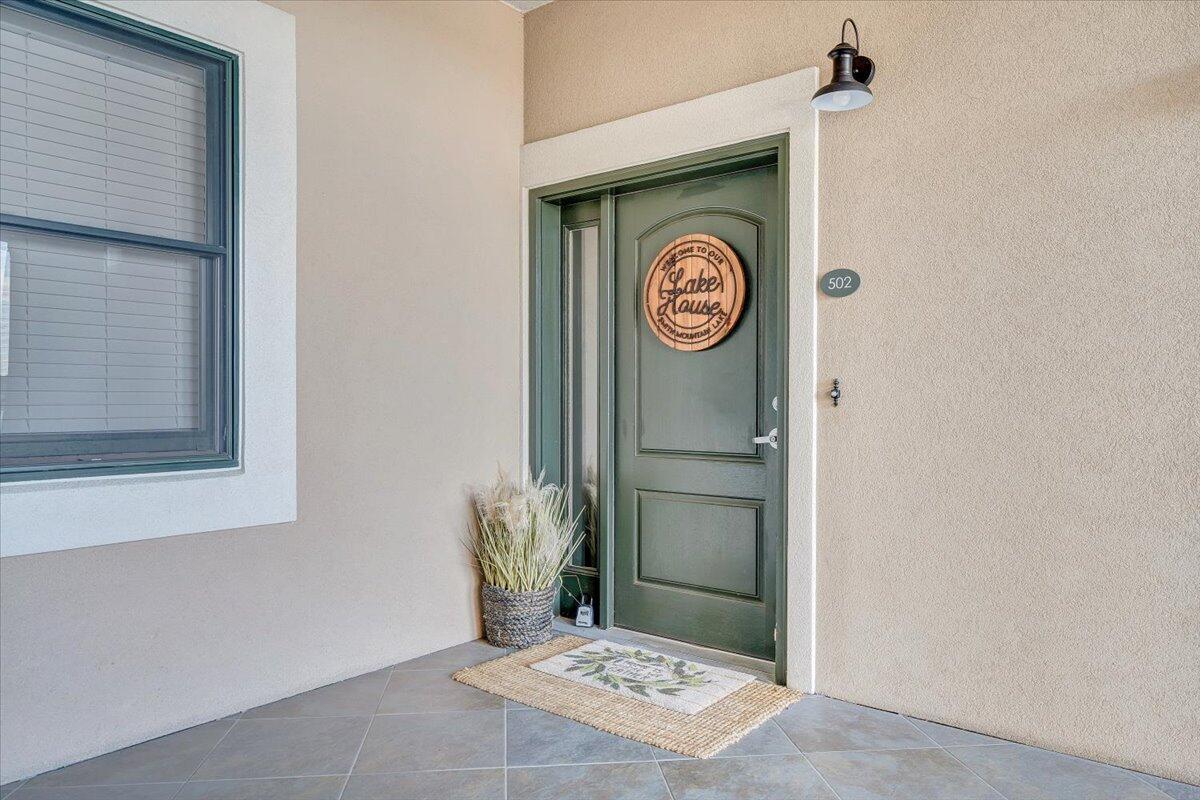 100 Bridgewater Pointe Place, Unit 502 Moneta, VA 24121 - Photo 45 of 54 a bathroom with a toilet and a shower curtain
