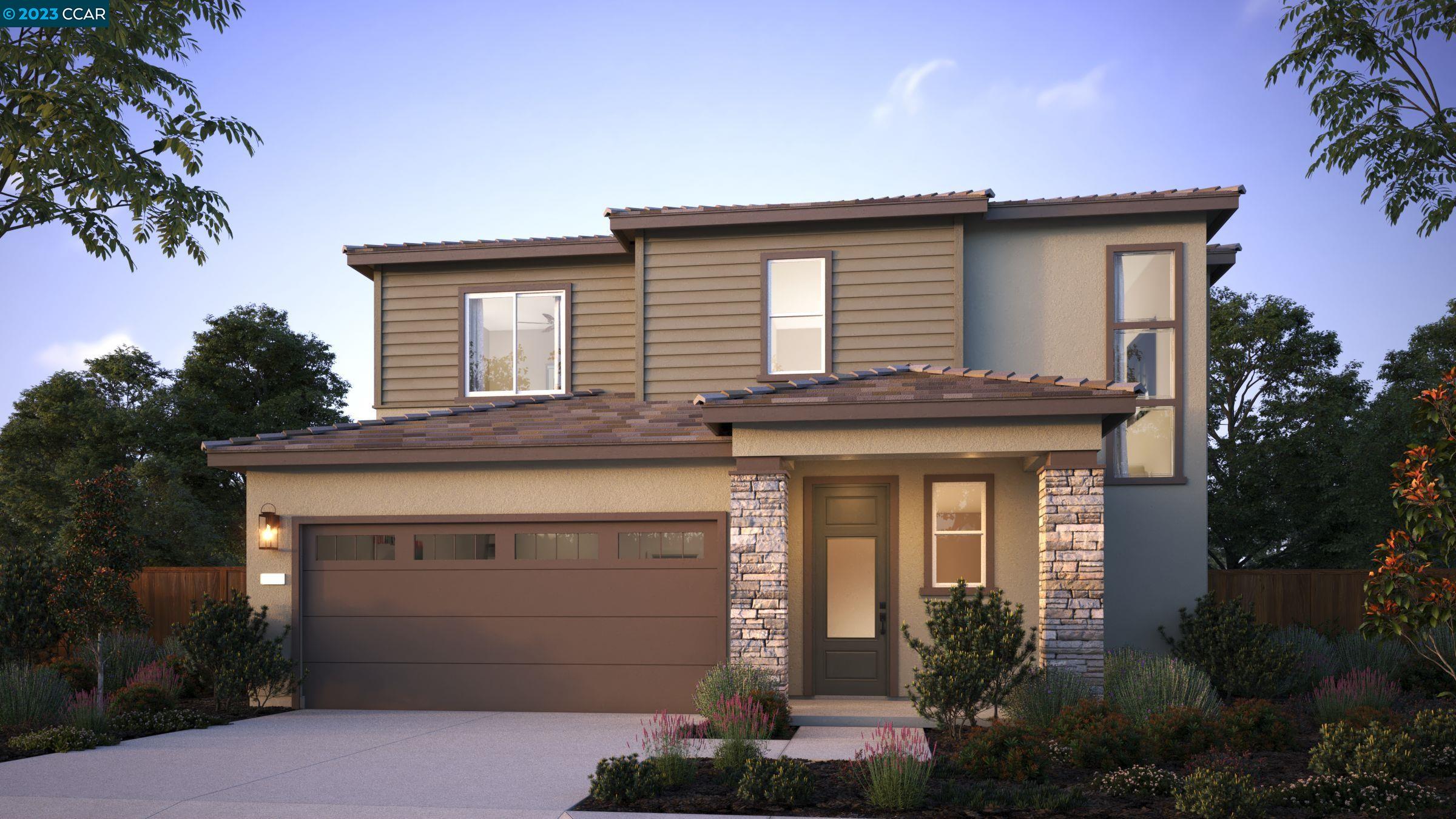 145 Bodega Drive Lodi, CA 95240 - Photo 1 of 1 a front view of a house with a garage