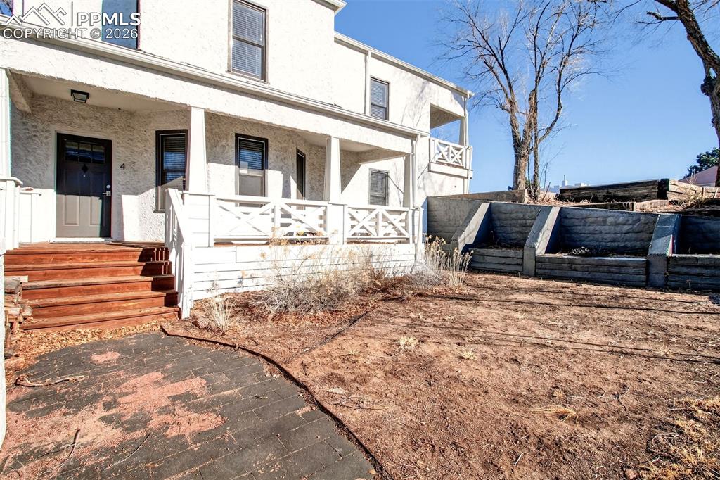 4 West Harrison Street Colorado Springs, CO 80907 - Photo 22 of 49 a view of a house with a yard
