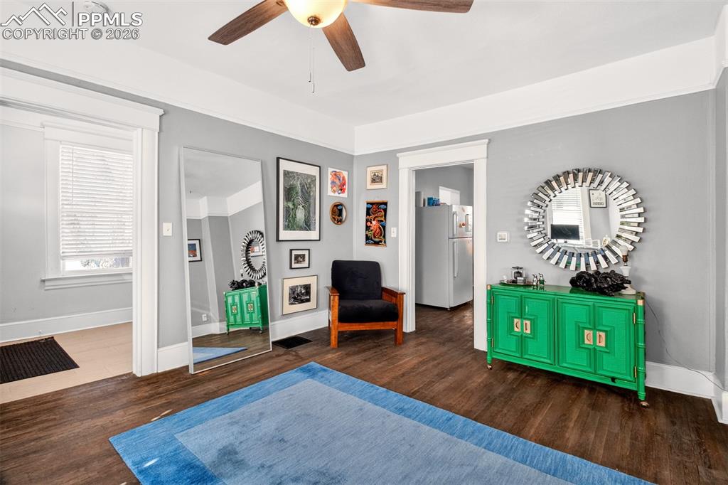 4 West Harrison Street Colorado Springs, CO 80907 - Photo 25 of 49 a living room with furniture and a wooden floor