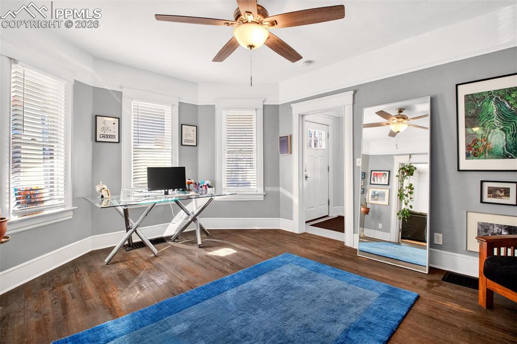 4 West Harrison Street Colorado Springs, CO 80907 - Photo 26 of 49 a workspace with wooden floor and windows