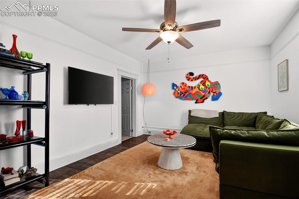 4 West Harrison Street Colorado Springs, CO 80907 - Photo 27 of 49 a living room with furniture and a flat screen tv