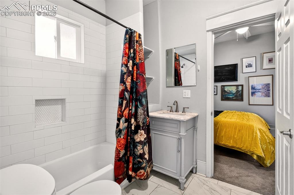 4 West Harrison Street Colorado Springs, CO 80907 - Photo 29 of 49 a bathroom with a sink toilet and shower