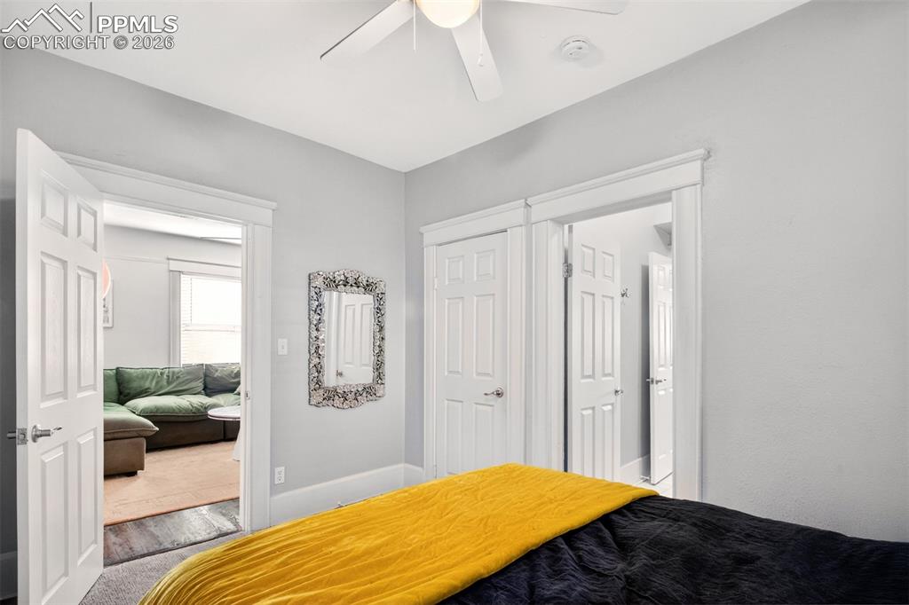 4 West Harrison Street Colorado Springs, CO 80907 - Photo 31 of 49 a bedroom with a bed and a couch