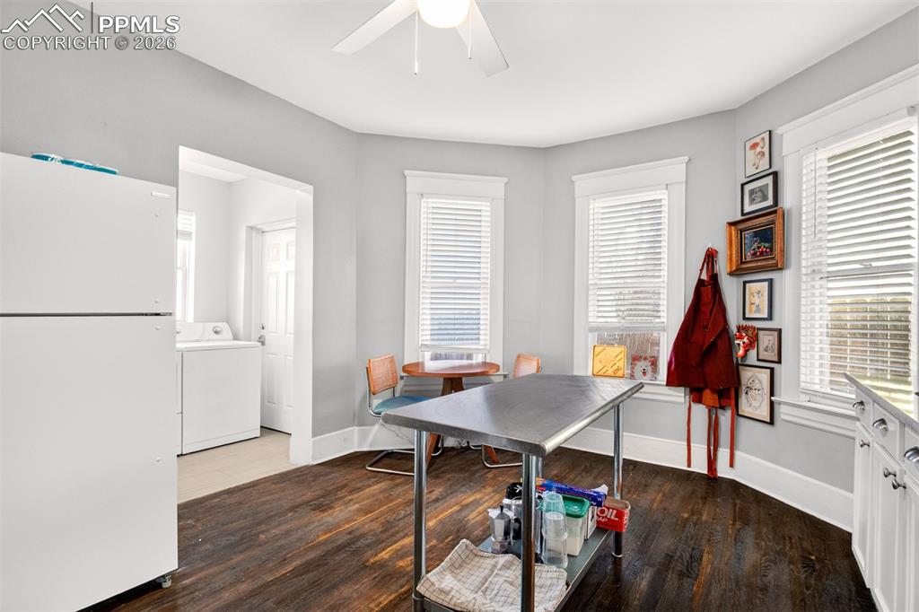 4 West Harrison Street Colorado Springs, CO 80907 - Photo 35 of 49 a dining room with furniture and wooden floor