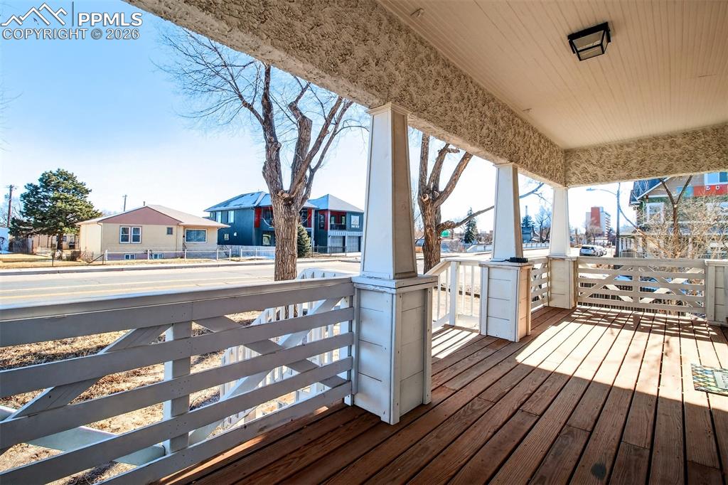 4 West Harrison Street Colorado Springs, CO 80907 - Photo 4 of 49 a view of a patio with wooden floor