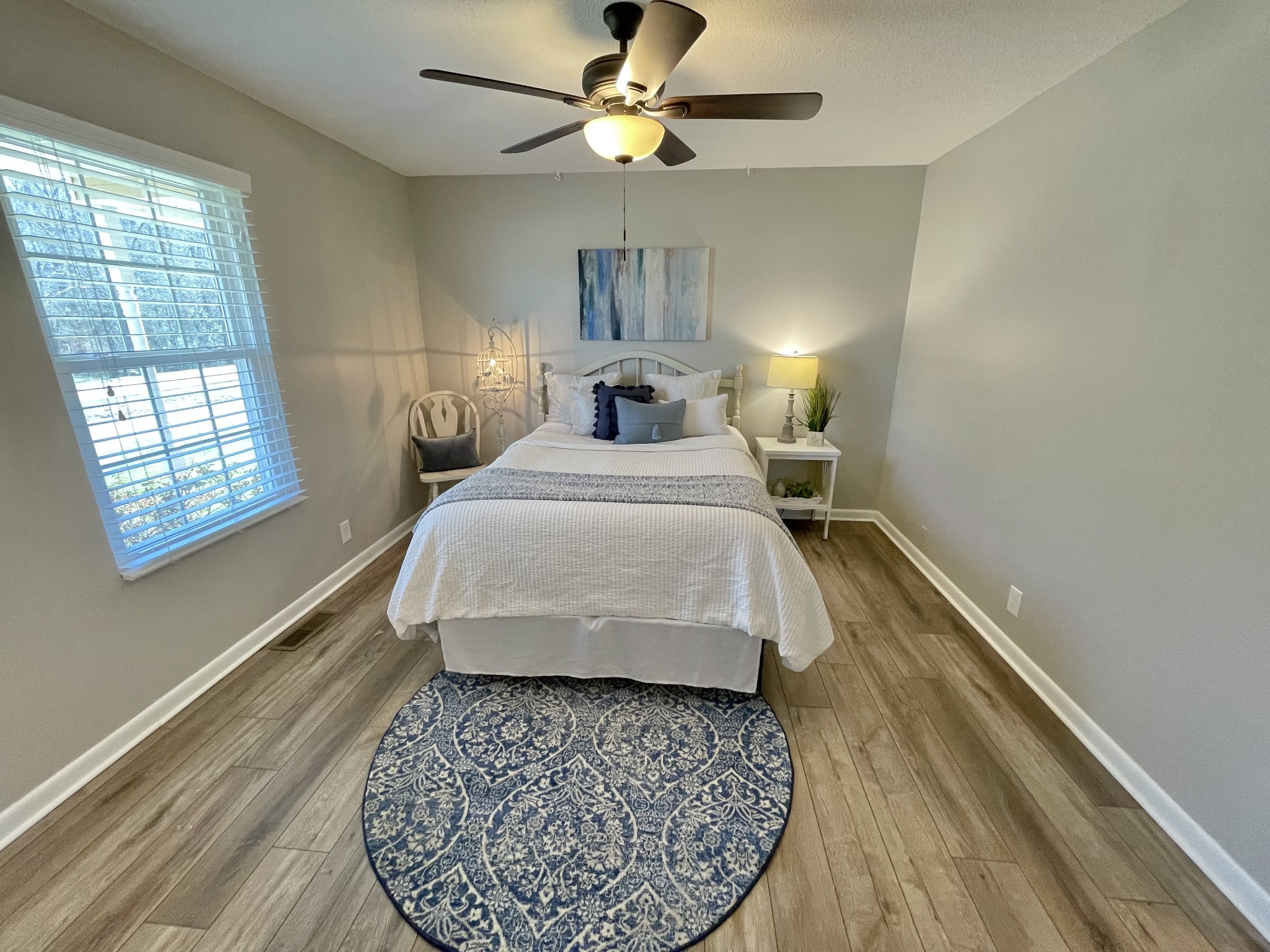 205 Wesley Chapel Road Lawrenceburg, TN 38464 - Photo 14 of 51 a bedroom with a bed and window