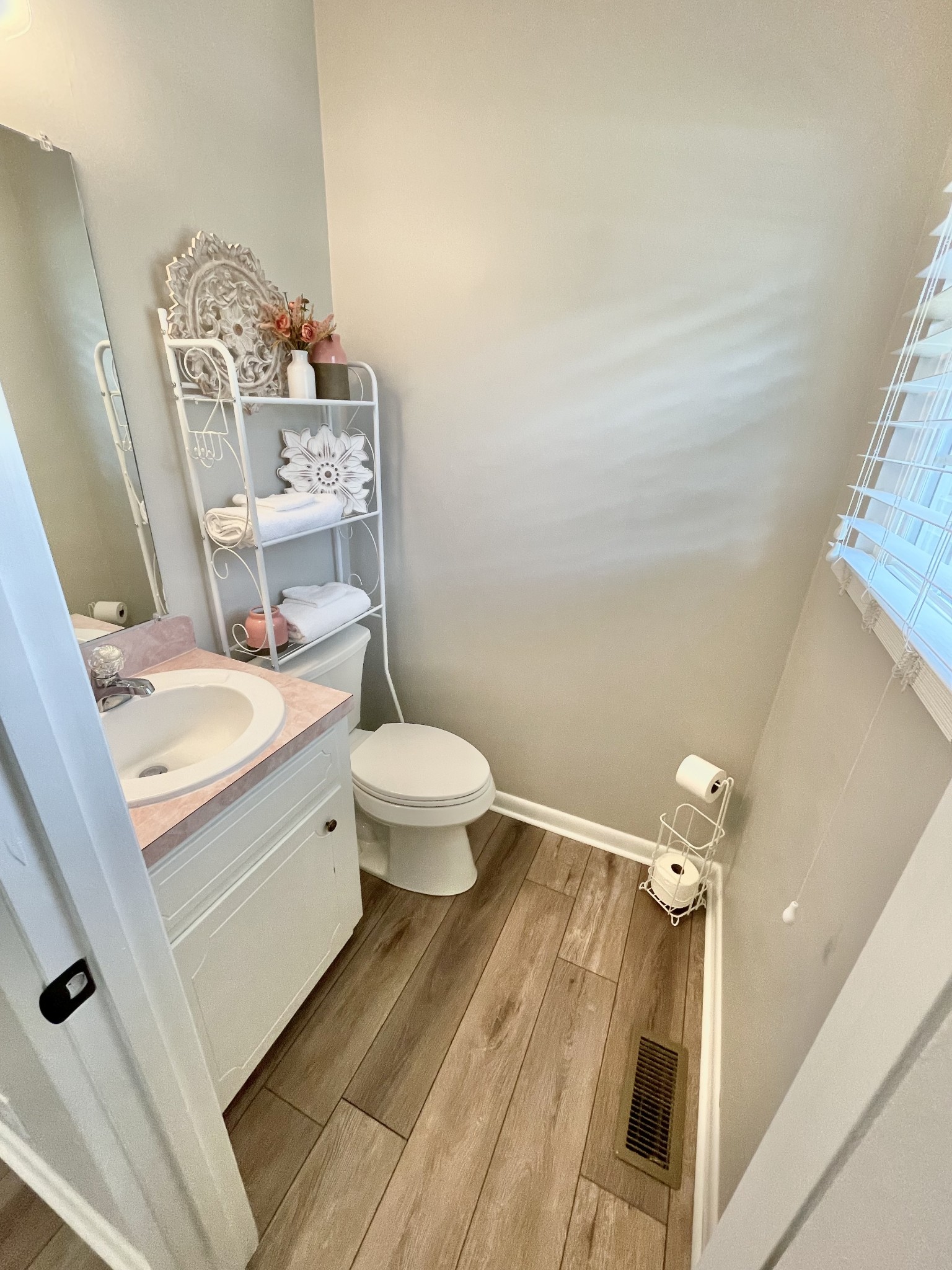 205 Wesley Chapel Road Lawrenceburg, TN 38464 - Photo 17 of 51 a bathroom with a sink a toilet and mirror