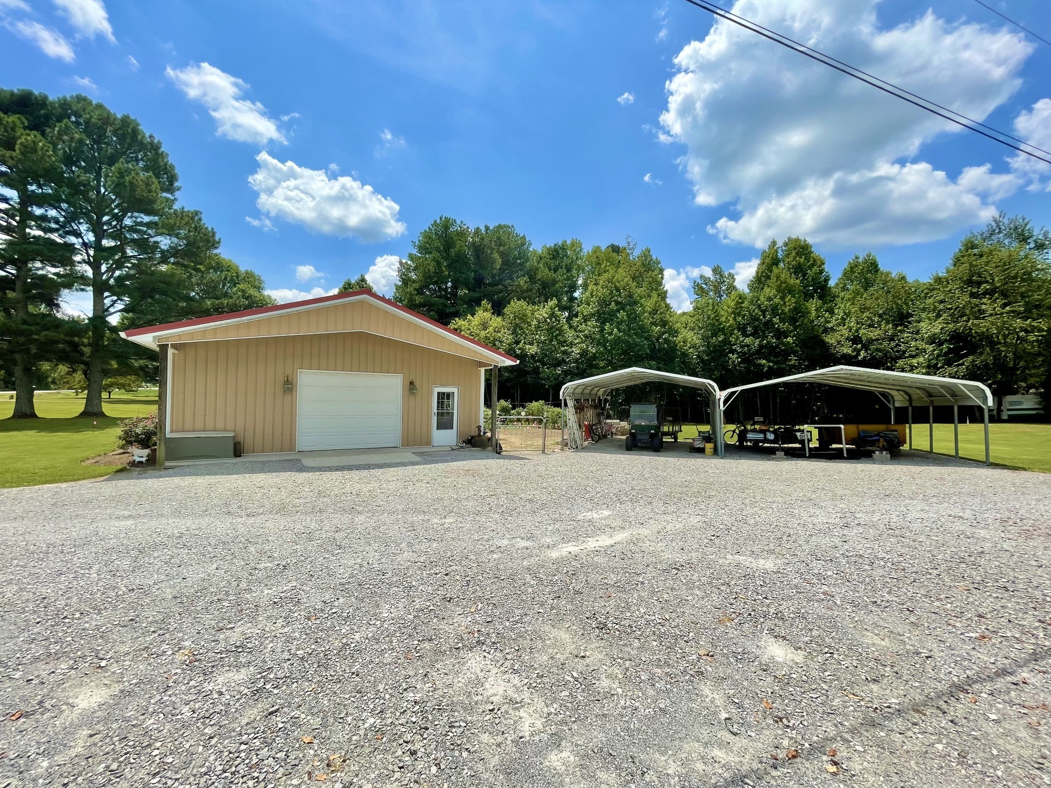 205 Wesley Chapel Road Lawrenceburg, TN 38464 - Photo 28 of 51 a front view of a house with garden
