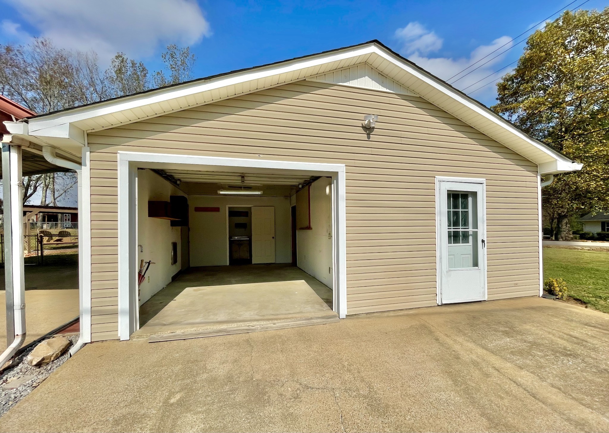 205 Wesley Chapel Road Lawrenceburg, TN 38464 - Photo 38 of 51 a view of a wooden house with an outdoor space