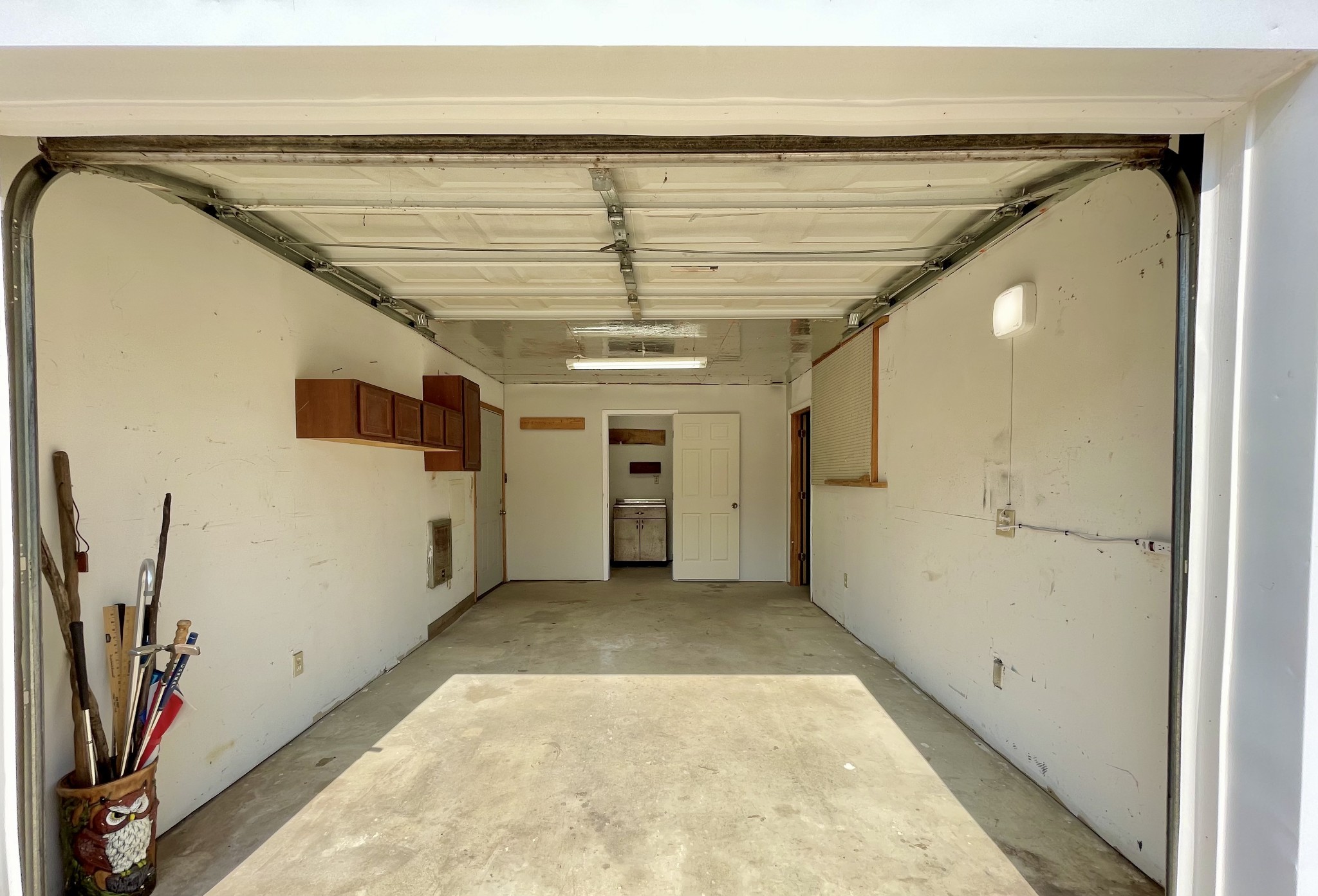 205 Wesley Chapel Road Lawrenceburg, TN 38464 - Photo 39 of 51 a view of a hallway with wooden floor and a ceiling fan