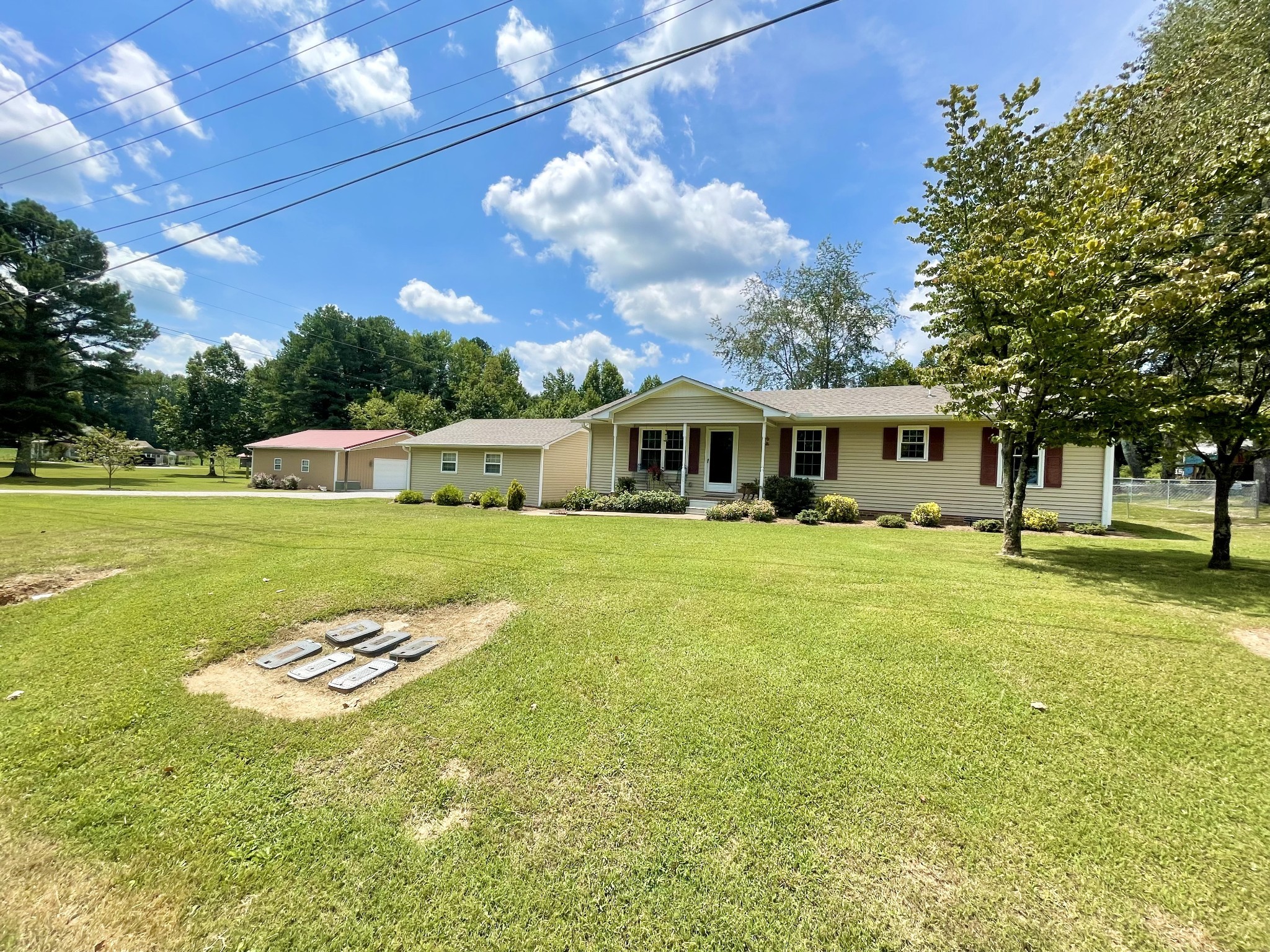 205 Wesley Chapel Road Lawrenceburg, TN 38464 - Photo 48 of 51 a swimming pool with outdoor seating and yard