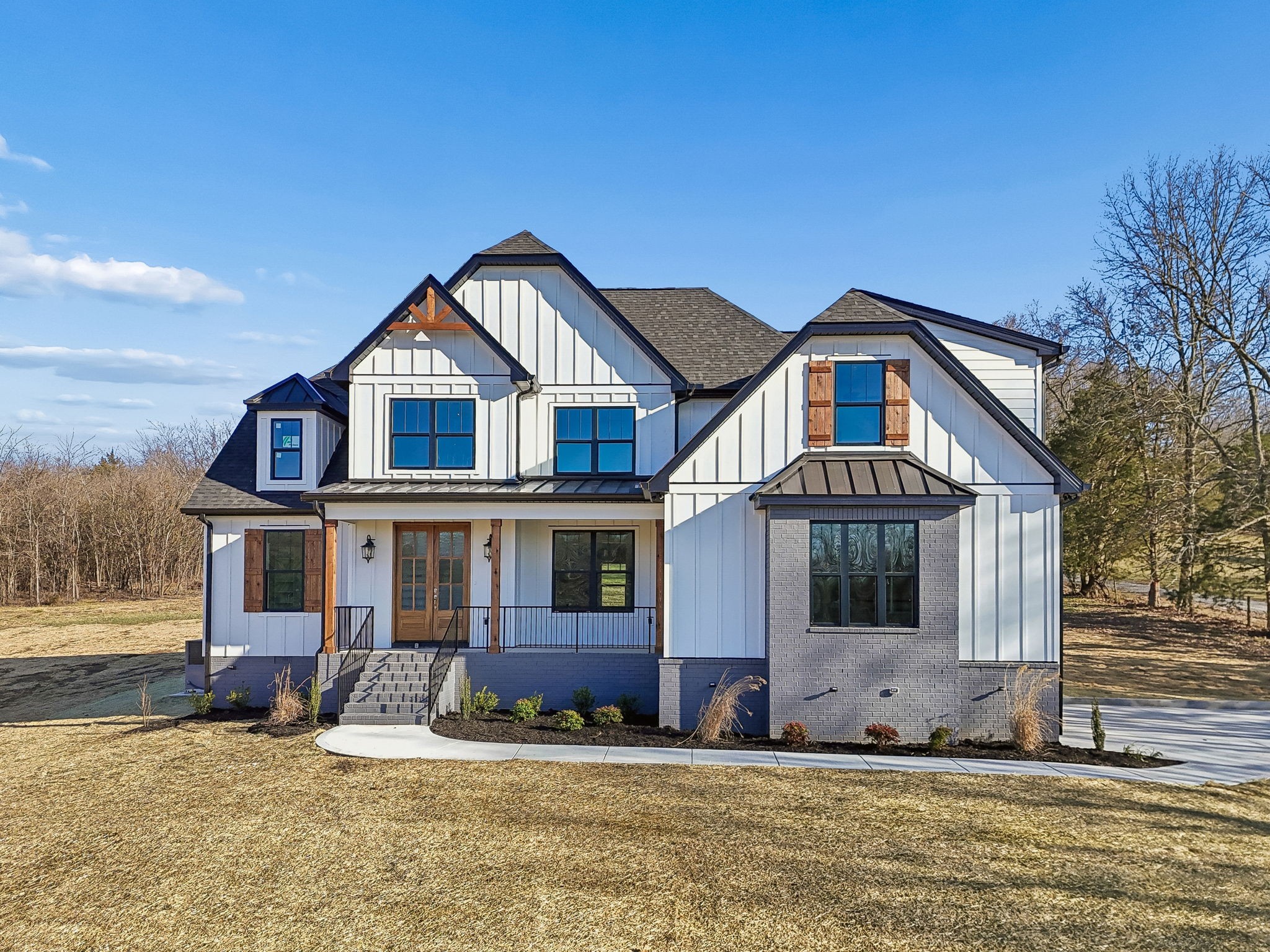 13821 Cainsville Road Lebanon, TN 37090 - Photo 2 of 68 a front view of a house with a yard