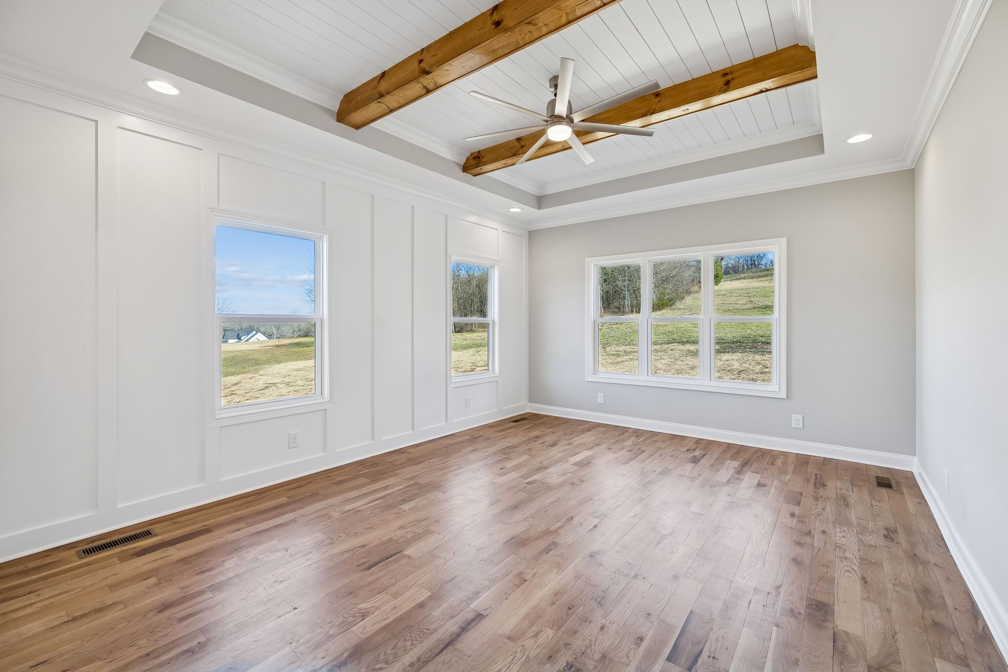 13821 Cainsville Road Lebanon, TN 37090 - Photo 30 of 68 an empty room with wooden floor and windows
