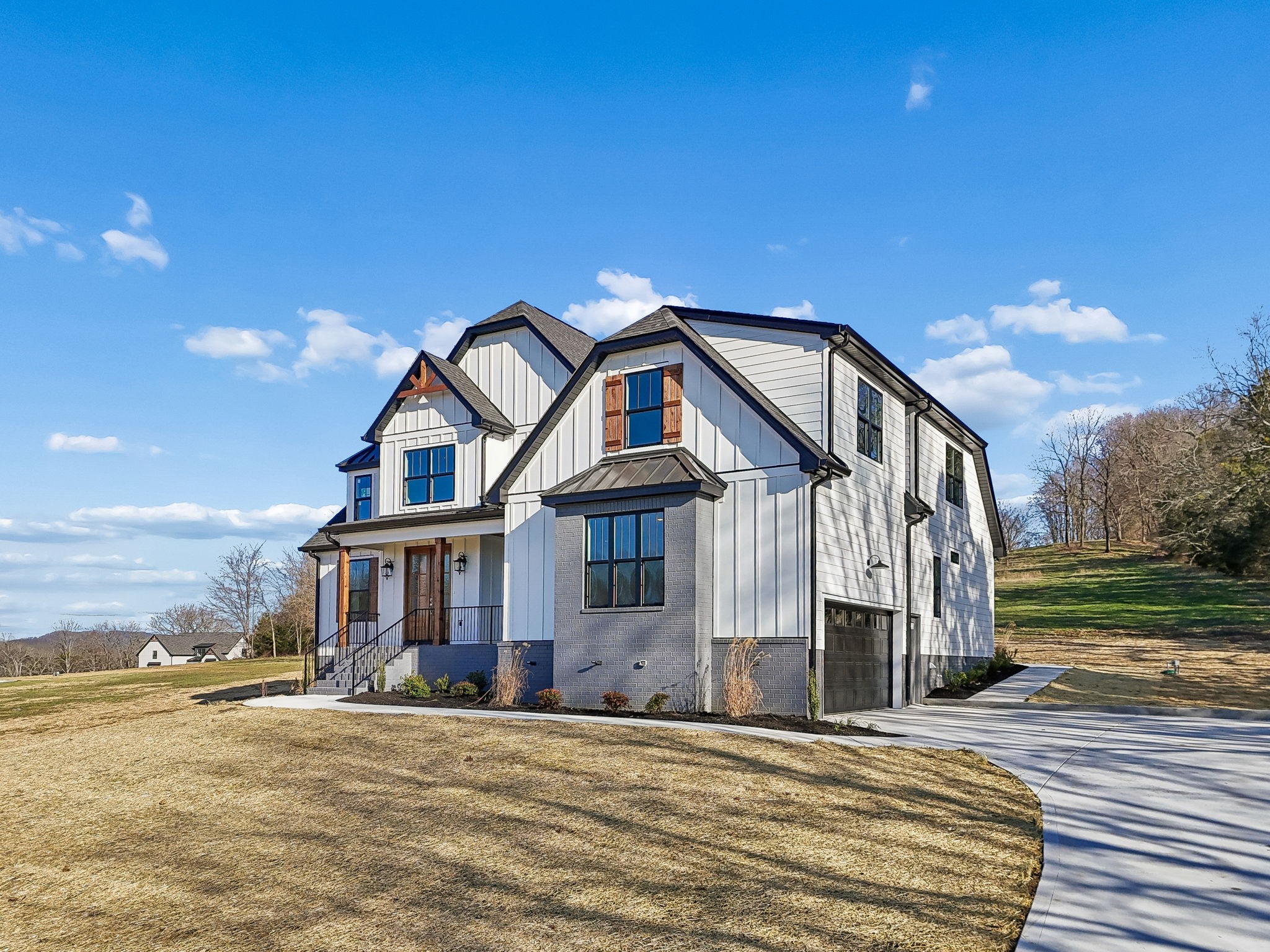 13821 Cainsville Road Lebanon, TN 37090 - Photo 3 of 68 a front view of a house with a yard