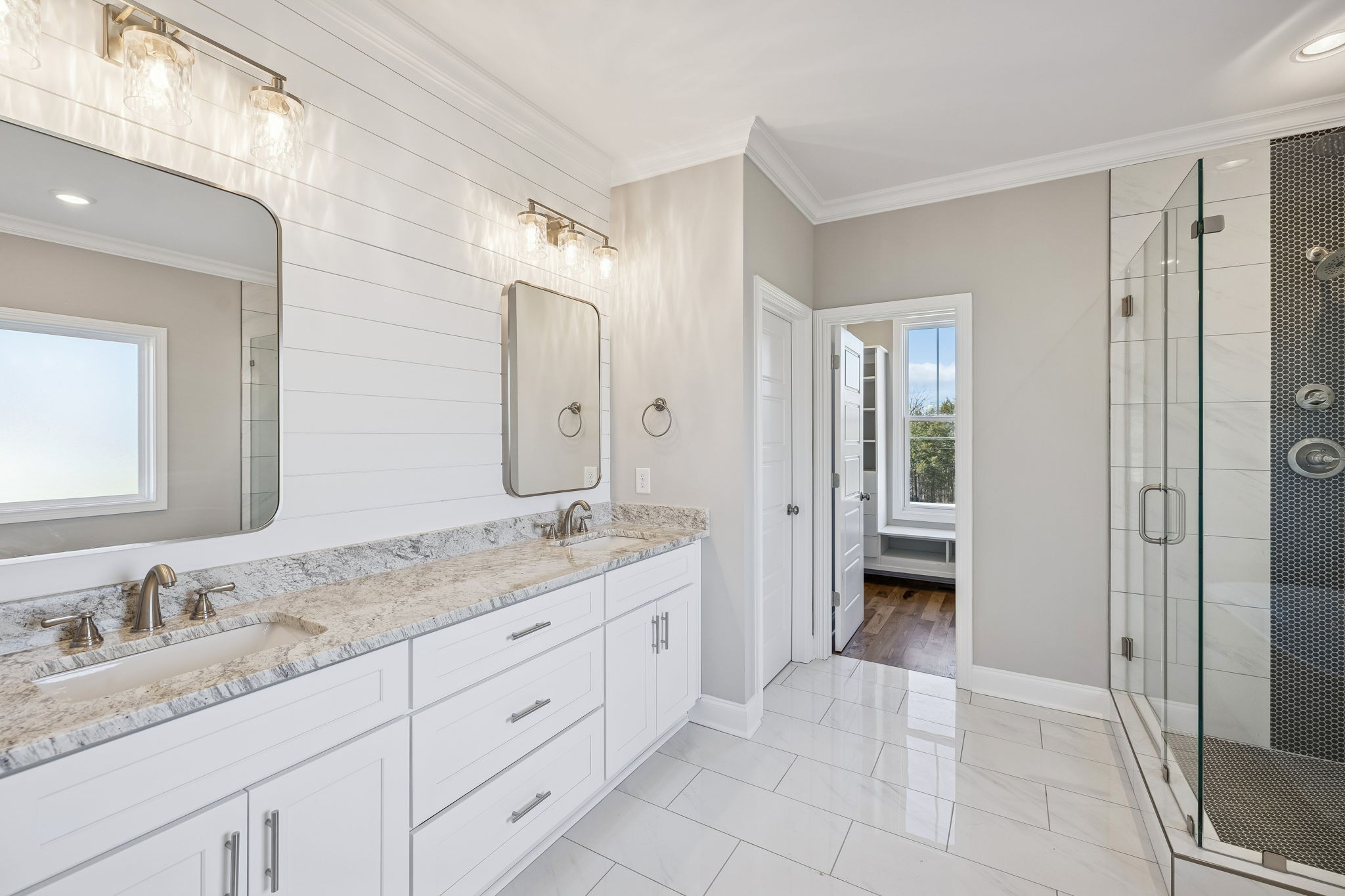13821 Cainsville Road Lebanon, TN 37090 - Photo 33 of 68 a spacious bathroom with a granite countertop sink mirror and double