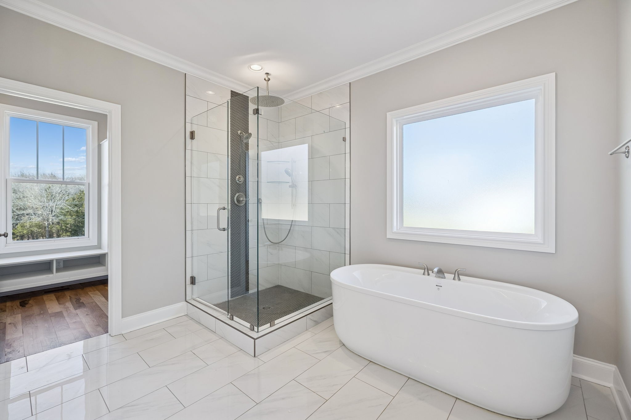 13821 Cainsville Road Lebanon, TN 37090 - Photo 35 of 68 a bathroom with a bathtub and a shower