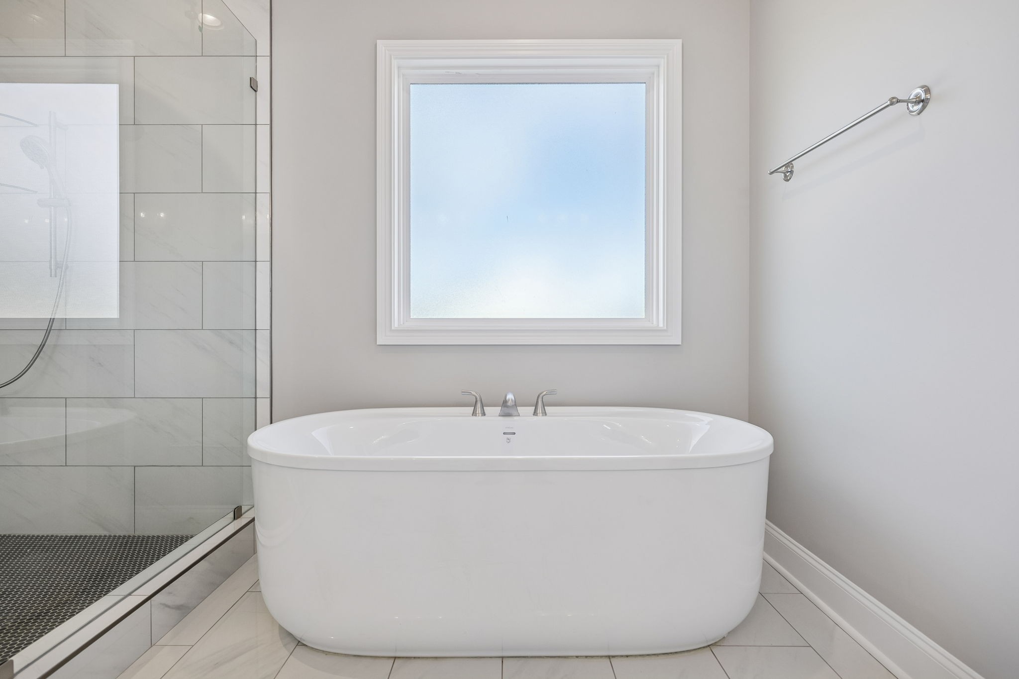 13821 Cainsville Road Lebanon, TN 37090 - Photo 36 of 68 a white bath tub sitting in a bathroom