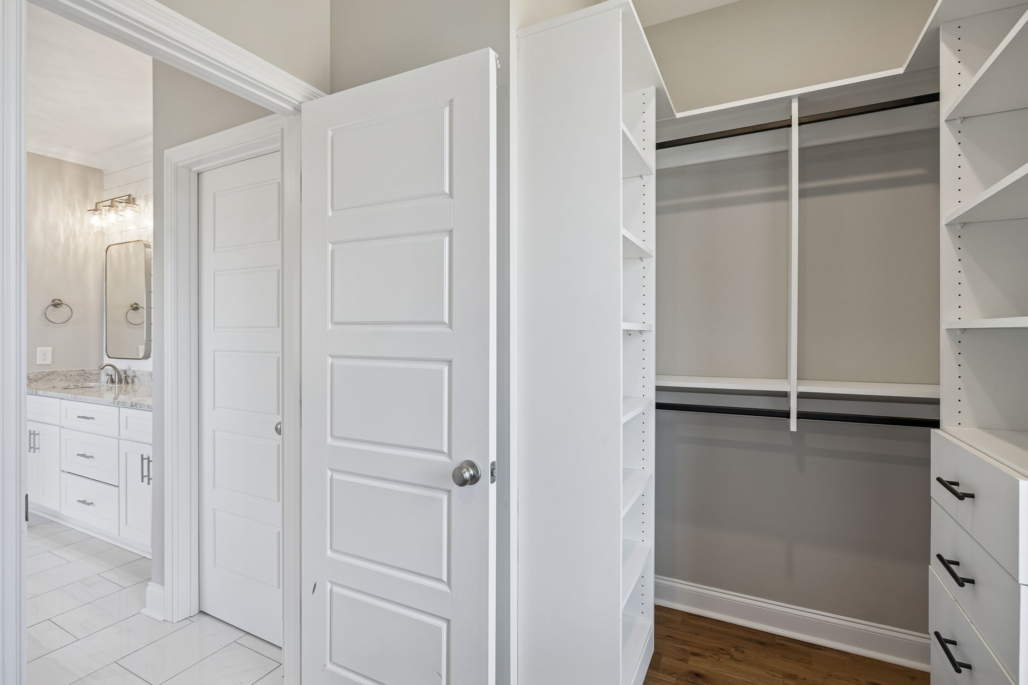 13821 Cainsville Road Lebanon, TN 37090 - Photo 40 of 68 a view of walk in closet with empty racks