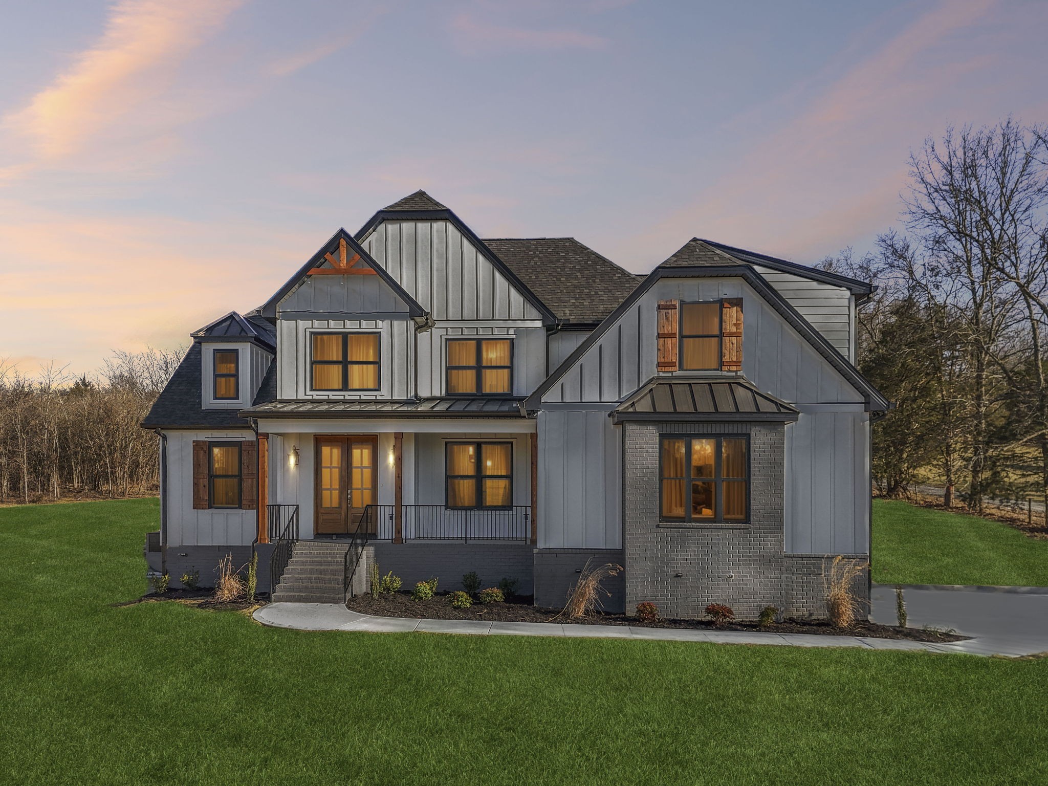 13821 Cainsville Road Lebanon, TN 37090 - Photo 4 of 68 a front view of a house with a garden and yard