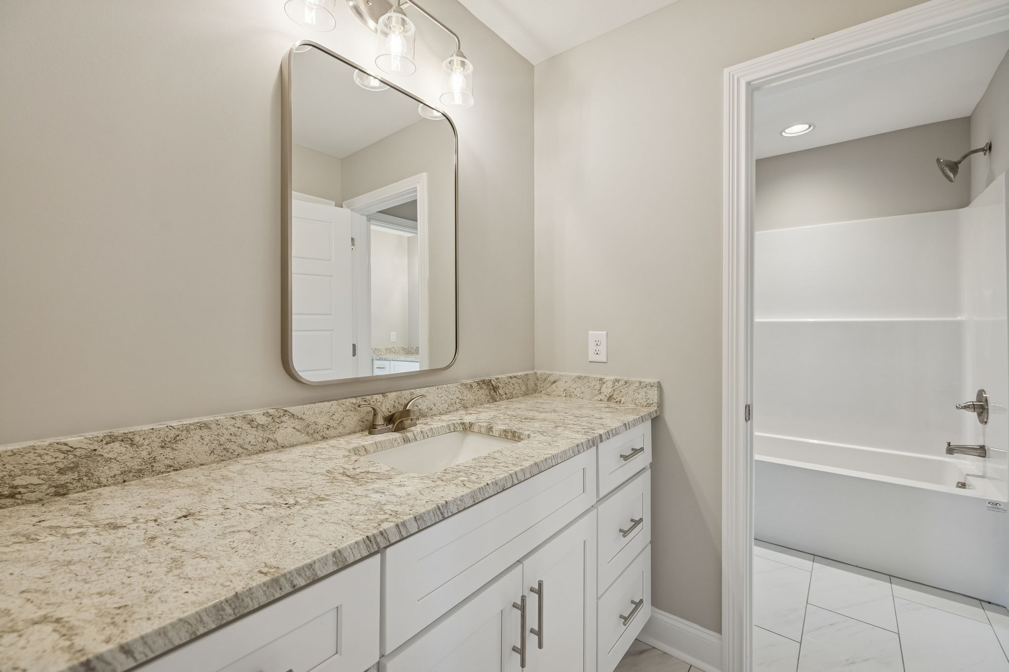 13821 Cainsville Road Lebanon, TN 37090 - Photo 44 of 68 a bathroom with a granite countertop sink mirror and double