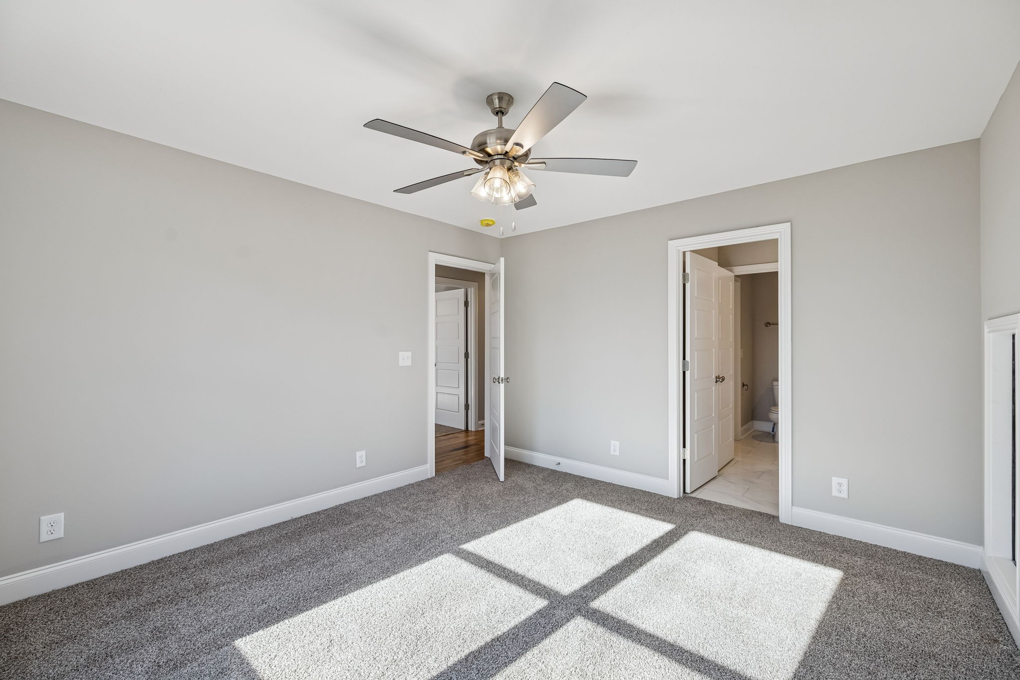 13821 Cainsville Road Lebanon, TN 37090 - Photo 48 of 68 an empty room with closet and a ceiling fan