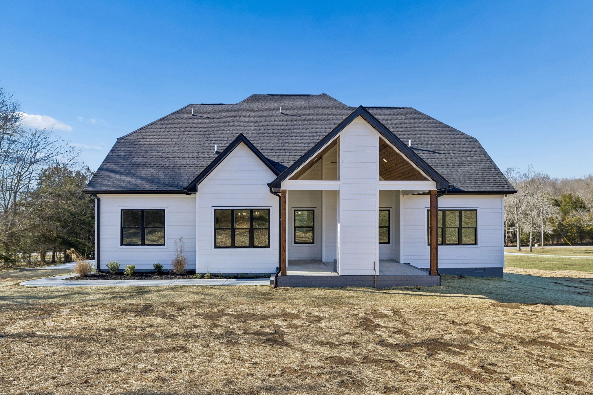 13821 Cainsville Road Lebanon, TN 37090 - Photo 56 of 68 a view of a house with a yard