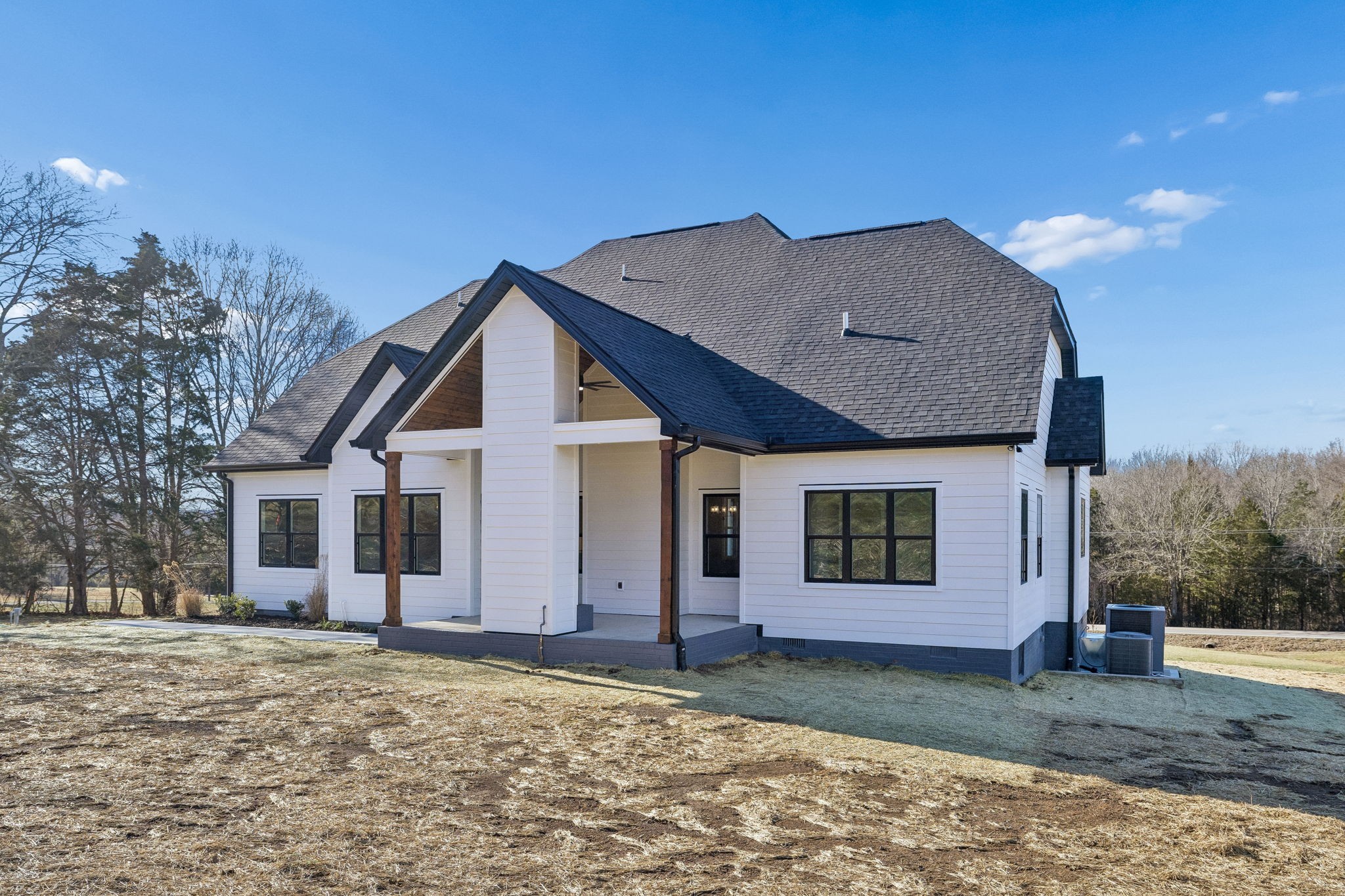 13821 Cainsville Road Lebanon, TN 37090 - Photo 57 of 68 a view of a house with a yard