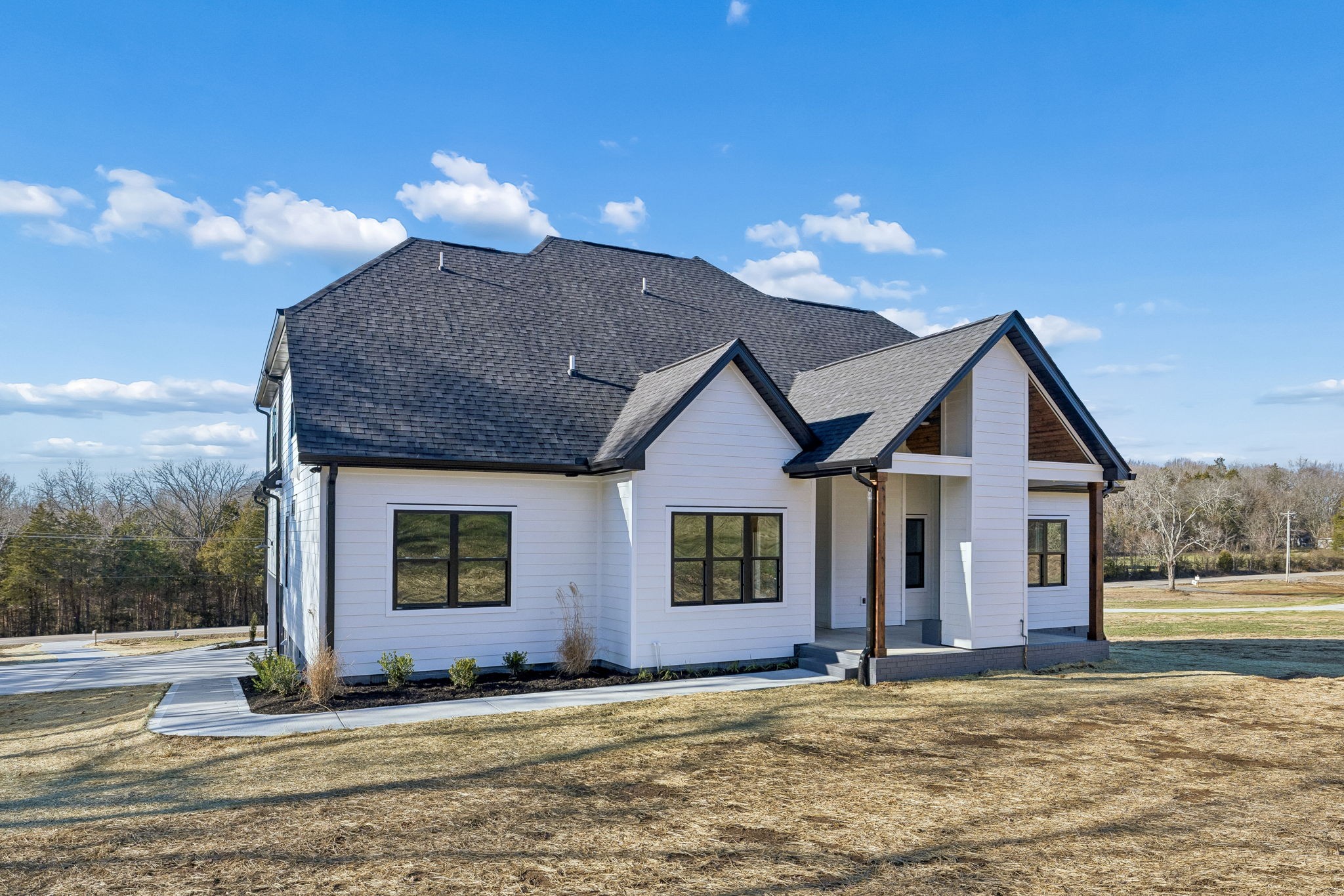 13821 Cainsville Road Lebanon, TN 37090 - Photo 58 of 68 a view of a house with a yard and chandelier