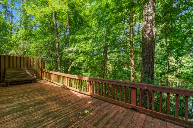 a view of balcony with yard