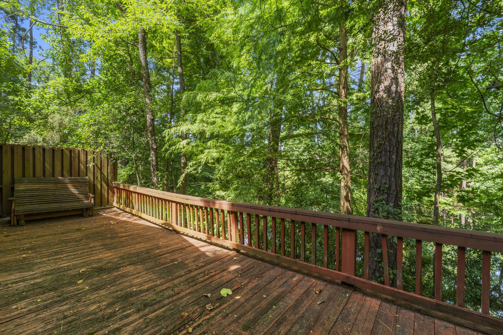 426 Nursery Road The Woodlands, TX 77380 - Photo 12 of 41 a view of balcony with wooden floor