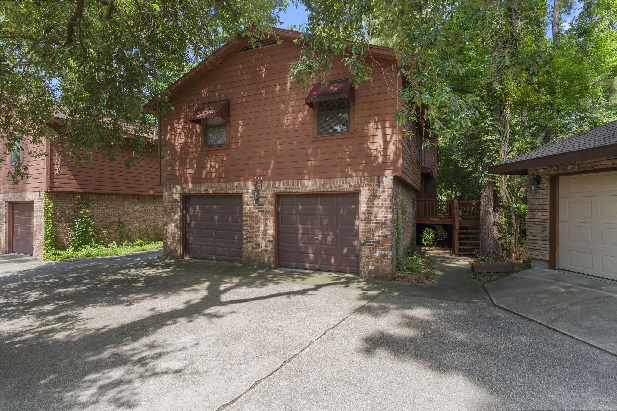 426 Nursery Road The Woodlands, TX 77380 - Photo 10 of 41 a front view of a house with a yard